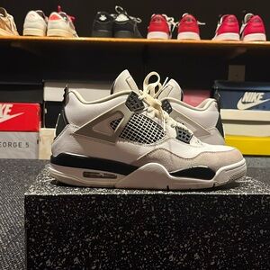 Jordan 4 Military Blacks worn